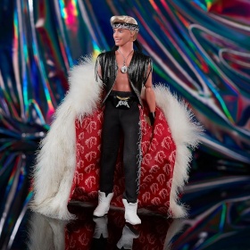 Ken doll in faux fur coat and black vest with fringe - the Barbie movie